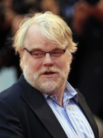 Portly male with white beard, slender Phoenix with dark hair