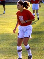 Mia Hamm -YOUNG WOMAN IN SHORTS ON SOCCER FIELD