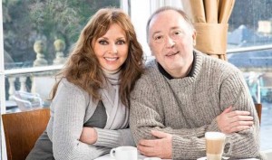 UK Star Carol & her cleft lipped brother sitting close to ea other at table