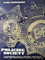 Blue and white book cover of "Policing Society" wh deals with bullying .