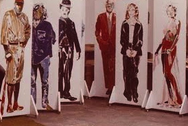 Colorful lifesized paintings of heroes, villains, fools" (e.g.,Benjamin Spock, Charley Chaplin, Charles Manson) by Karl Schohnborn