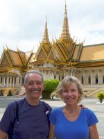 Cleft lip affected author and wife at Cambodian king's palace.