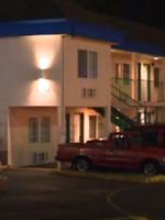 Tan 2-story motel where Serial killer botches her 1st attempt.