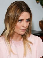 Bust shot of pensive cyberbullying revenge porn victim Misha Barton in pink top.