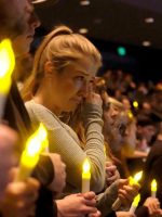 Candles at memorial vigil. Why a Crime investigation is needed into Borderline Bar shooting.