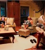 Can you find the Cleft Heart reader in living room with several people